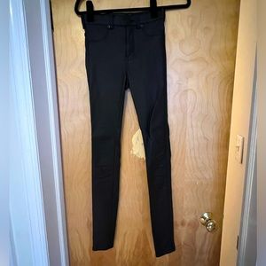 Black leather skinny jeans
